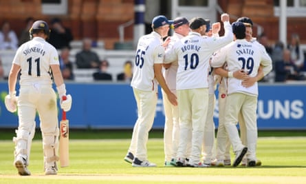 Essex’s Sam Cook of Essex celebrates taking the wicket of Mark Stoneman of Middlesex at Lord’s.