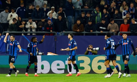 Ademola Lookman (second from left) celebrates with his teammates after scoring Atalanta’s second