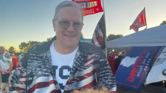 Tim McCorkle with a Trump hat at the fair