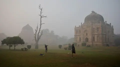 Reuters FILE PHOTO: Men play badminton at Lodhi Garden while the sky is enveloped with smog after Delhi's air quality turned "hazardous" due to alarming air pollution, in New Delhi, India, November 15, 2024. REUTERS/Anushree Fadnavis/File Photo