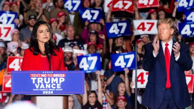 Tulsi Gabbard speaking next to Trump in North Carolina