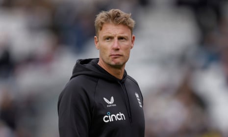 Midshot of Flintoff in hooded tracksuit top with background blurred