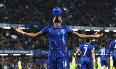 Christopher Nkunku poses with a balloon after putting Chelsea 3-1 up against Gent in their Conference League match on Thursday