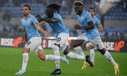 Pedro is pursued by his Lazio teammates after breaking the deadlock against Nice.