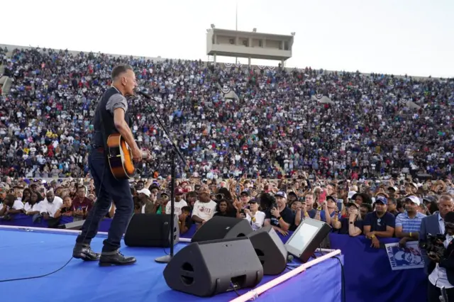 Bruce Springsteen performs during a rally for Democratic presidential nominee U.S. Vice President Kamala Harris in Atlanta, Georgia