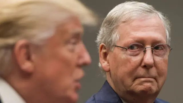 Donald Trump speaks alongside Mitch McConnell at a meeting in the White House in 2017