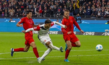 Omar Marmoush scores Eintracht Frankfurt’s late equaliser against Bayern Munich.