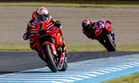 Francesco Bagnaia holds off title rival Jorge Martín to win in Motegi.