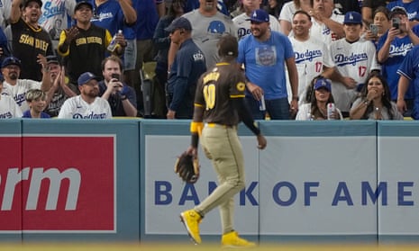 San Diego Padres left fielder Jurickson Profar looks at the crowd after items were thrown at him on Sunday night