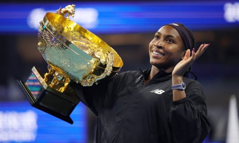 Coco Gauff with the China Open trophy after defeating Karolina Muchova in the final.