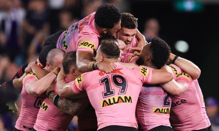 Panthers players celebrate victory in the 2024 NRL grand final match against the Storm