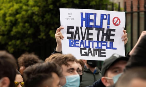 Fans protest outside the stadium against the proposed European Super league ahead of the game between Chelsea and Brighton at Stamford Bridge stadium in 2021