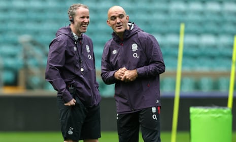 The England defence coach, Joe El-Abd (right), talks with Dan Tobin, strength and conditioning coach, at the Allianz Stadium.