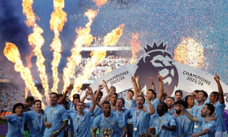 Manchester City lift the Premier League trophy in May 2024.