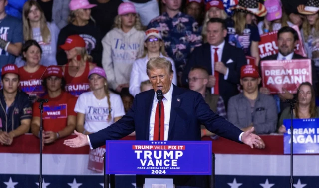 Former US President and current Republican presidential nominee Donald Trump delivers remarks during a campaign rally at the Salem Civic Center in Salem, Virginia, USA