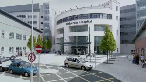 Google An exterior shot of University Hospital Coventry. Above the white round entrance building a sign reads "University Hospital". Cars are driving along a road in front of the building and people are walking on a pedestrianised area.