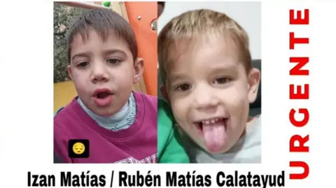 Family handout A "missing" poster showing two photos of Izan and Rubén Matías, with their names written underneath in black text and "urgente" written in red at the side