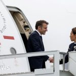 Macron lands in cyclone-hit Mayotte bringing food and health aid